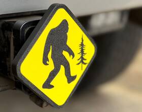 Muchwaterdesign 759126650490 Sasquatch Crossing Plastic Hitch Cover - 2 Inch Yellow