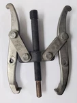 Otc No. 1025 Reversible Two Jaw Gear Puller 7" Arms 9/16"-20 Drive Screw Used. Price: $50.00.