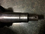 406267R92 - New Front Axle Spindle For Farmall 504, 544, 606, 656 Tractors Used. Price: $150.00.