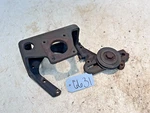 Satoh Bison S-650G Tractor Engine Bracket W/ Belt Tensioner Pulley Used. Price: $85.00.
