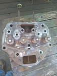 John Deere Styled Model Cylinder Head A4226 Used. Price: $125.00.