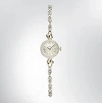 Vintage 1960S Ladies' Rolex Manual Watch 14K White Gold W/diamonds REF.97446 Pre-owned. Price: $4400.00.