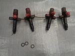 Farmall 350. D-193 Continental Diesel Engine Set Of Injectors. Used. Price: $225.00.