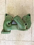 John Deere Gas Manifold #F1074R Used. Price: $295.00.