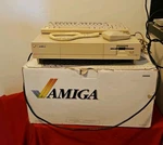 Commodore Amiga 1000 Computer In Box With Keyboard & Mouse Powers On As Is. Price: $999.99.