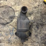 Farmall Tractor Upper Water Tube Thermostat Housing 9568-DA Used. Price: $40.00.