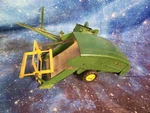 Antique / Vintage John Deere Pull Type Combine Harvester Toy Good Condition. Used. Price: $145.00.