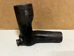 Farmall Gas Tractor 369396R1: Water Outlet, W/plugs Used. Price: $20.00.