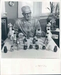 1959 Press Photo Artist John Stevens Makes Vases & Shakers From Light Bulbs Unspecified. Price: $23.99.