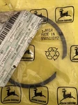 Genuine John Deere Snap Ring R81R New Oem. Price: $15.00.