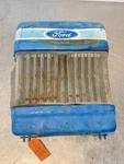 1986 Ford 1210 Tractor Front Hood Nose Cone W/ Grille Used. Price: $225.00.