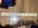 New Holland Genuine Part #86604033 Decal. Price: $42.50.
