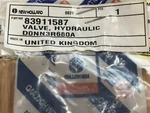 New Holland Genuine Part # 83911587 Hydraulic Valve. Price: $21.25.