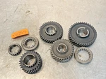 John Deere 2640 Tractor Transmission Pinion Shaft Gears T31080 L28664 R55638 Used. Price: $295.00.